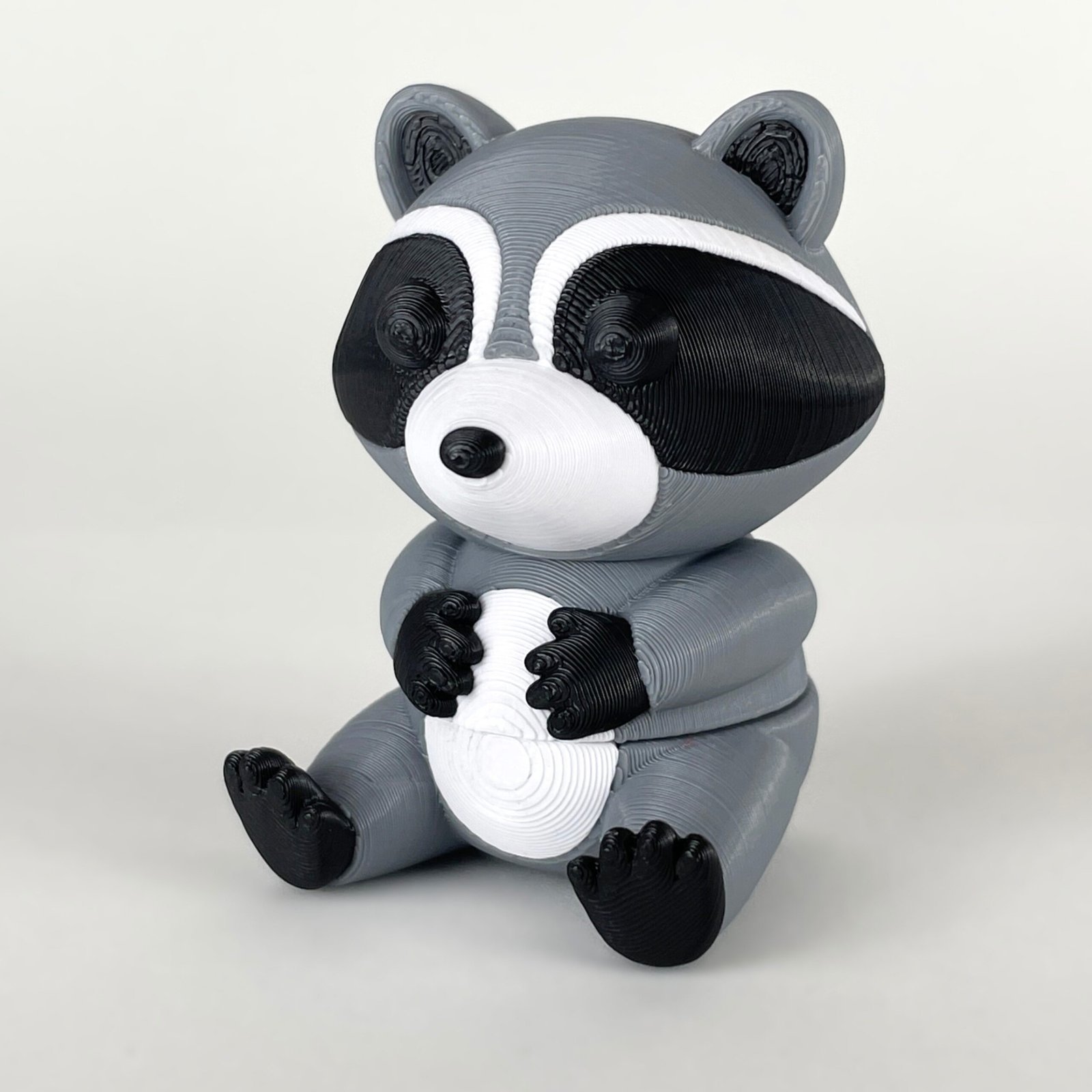 tutcra flexy3d raccoon keychain 2 3D printed articulated raccoon keychain, view 2
